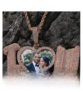 Detail of rose gold hip hop necklace featuring iced-out heart locket and I love you letters