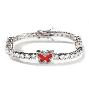Detail of s925 silver tennis chain with red enamel butterfly pendant and clear zircon stones