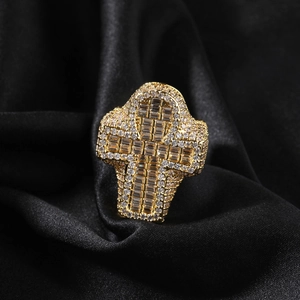 Detailed macro view of gold plated Ankh cross ring with pavé set zircon stones