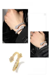 Close-up of hip hop bracelets with rectangle cubic zirconia in gold and silver finish