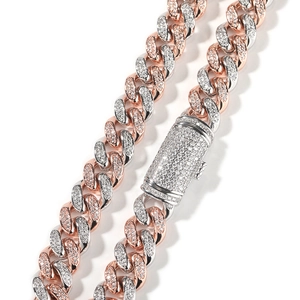 Close-up of two-tone hip hop Cuban chain with pave-set cubic zirconia and round clasp