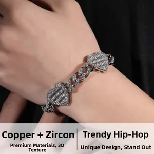 Close-up of hip hop silver Cuban bracelet with sparkling zircon hearts for men