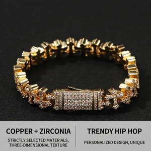 Macro shot of gold-plated copper cross bracelet links with micro-pave cubic zirconia
