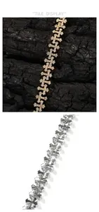 Close-up of hip-hop cross link bracelets in gold and silver with cubic zirconia inlays