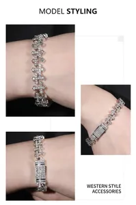 Close-up of hip-hop cross bracelet with white cubic zirconia inlays and secure box clasp