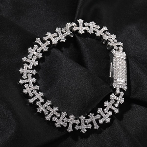 Detailed macro view of 11.5mm silver cross link bracelet with shimmering zircon stones