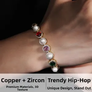Close-up of luxury pearl bracelet with colorful gemstones and gold-plated copper chain