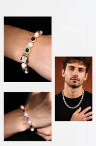 Detail of colorful gemstones and pearls on a gold-plated bracelet with pavé clasp