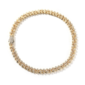 Detailed view of hip hop gold cross chain necklace with iced-out cubic zirconia stones