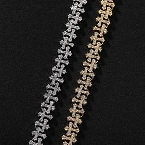 Hip hop style iced out cross necklace in gold and silver finish with sparkling zircons
