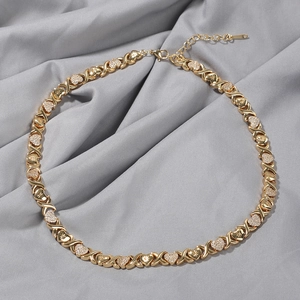 Gold plated XOXO necklace with heart charms and cubic zirconia for women in hip hop style