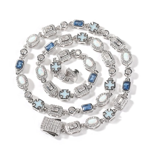 Detailed macro view of luxury silver bracelet with blue sapphires and white opal links