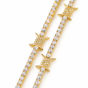 Macro shot of hip-hop tennis necklace with copper plated gold and cubic zirconia thorns