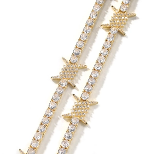 Hip hop style gold tennis bracelet with cubic zirconia and thorn wire design accents