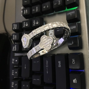Hip hop heart clover cuff bracelet in silver finish with pavé set cubic zirconia stones