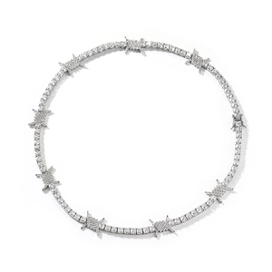 Detail of silver tennis chain with cubic zirconia barbed wire link industrial style