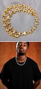 Detail von Hip-Hop Kreuzgliederkette mit Volldiamant-Besatz in Gold und Silber