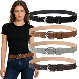 Detail of suede rivet belt for women with silver metal pin buckle and vintage punk style