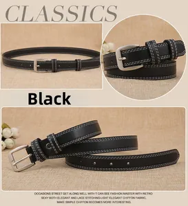 Detail of slim black leather belt with silver square buckle and white double stitching
