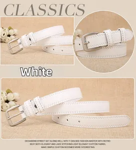 Close-up of slim white belt with matte silver square buckle and clean stitching detail