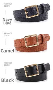Detailed view of crocodile pattern belts in navy, camel and black with gold square buckles