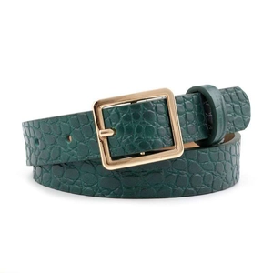 Close-up of dark green faux crocodile leather belt featuring a sleek gold square buckle