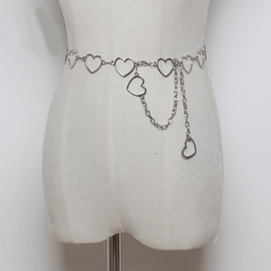 Close-up of silver metal heart waist chain with double-layered dangling charms on a mannequin