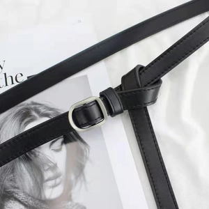 Minimalist black slim leather belt for women featuring silver square buckle and matte finish