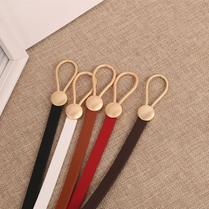 Set of 5 minimalist faux leather skinny belts for women in black, brown, and red with gold buckles