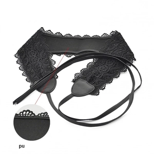 Detail of black floral lace waist belt with PU leather patches and slim strap ties