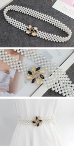 Detailed macro view of an elegant elastic pearl belt featuring a floral crystal buckle