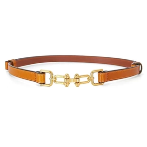 Close-up of caramel brown leather skinny belt with golden horsebit buckle and stitching