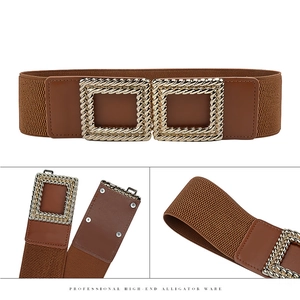 Detailed view of the brown elastic belt featuring a gold square buckle and snap buttons