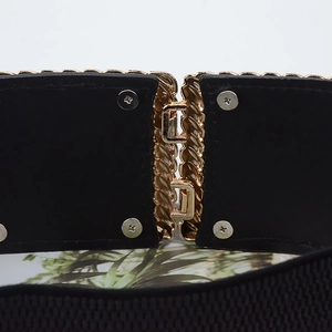 Close-up of golden metal interlocking buckle with secure screw fixing on black elastic belt