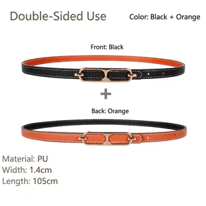 Detail view of 1.4cm reversible PU leather belt for women in black and orange colors