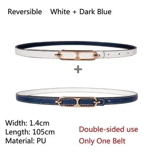 Detail view of 1.4cm reversible white and navy PU leather belt with gold metal buckle