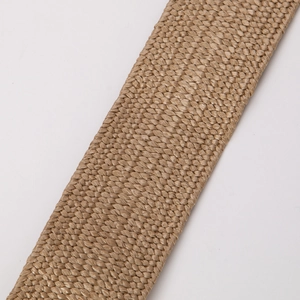Detailed macro view of Bohemian style khaki PP straw braided belt with intricate weaving texture
