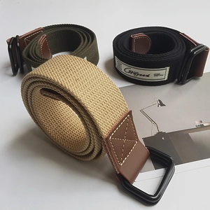 Men's canvas belts with black double D-ring buckles and leather tips in three colors