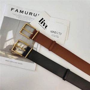 Minimalist leather belts in black and brown with square gold buckles for women