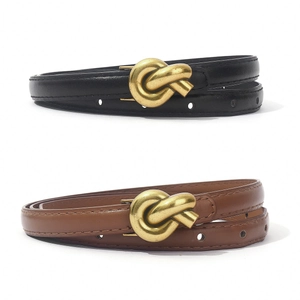 Minimalist leather belts in black and brown with elegant gold knotted metal buckles