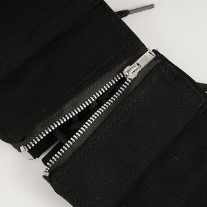 Fashionable black corset belt for women featuring a silver zipper and lace-up details