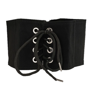 Fashionable black wide corset belt with lace-up design and silver eyelets for women