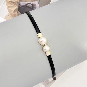 Elegant thin black patent leather belt with double pearl gold buckle for dresses