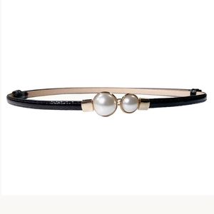 Elegant thin black patent leather belt for women featuring double pearl gold buckle detail