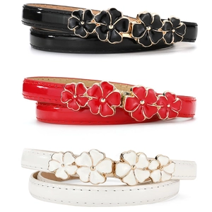 Vintage style faux suede belts for women in black, red, and white with floral gold buckles