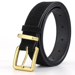 Close-up of black suede belt with vintage matte gold pin buckle and stitched detail