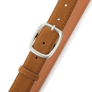 Detail shot of brown suede leather belt with vintage silver square buckle and fine stitching