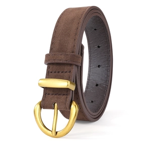 Macro shot of faux suede brown belt texture with elegant golden round buckle detail