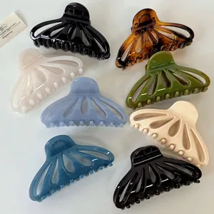 Set of minimalist glossy hollow fan-shaped shark hair clips in seven assorted colors