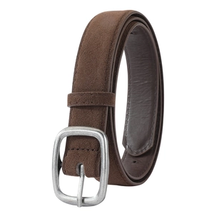 Detail of vintage brown faux suede belt with matte silver buckle for denim jeans